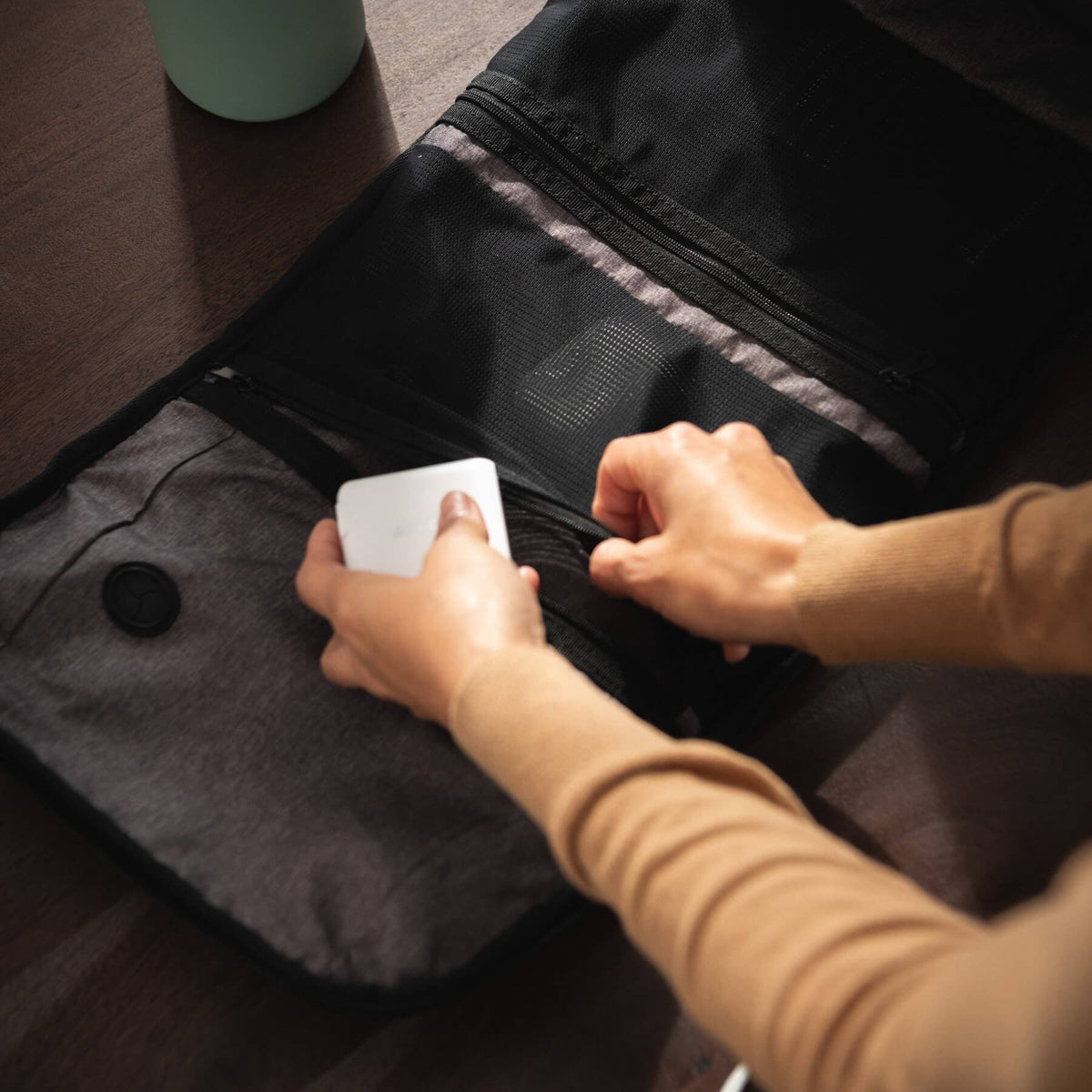 NOMATIC Backpack 14L in black, product features graphic