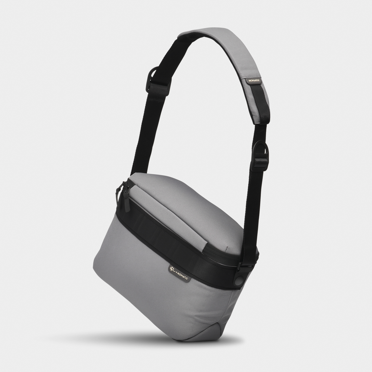 Luma Camera Sling 12L Stone Side Angle View With Strap #color_stone