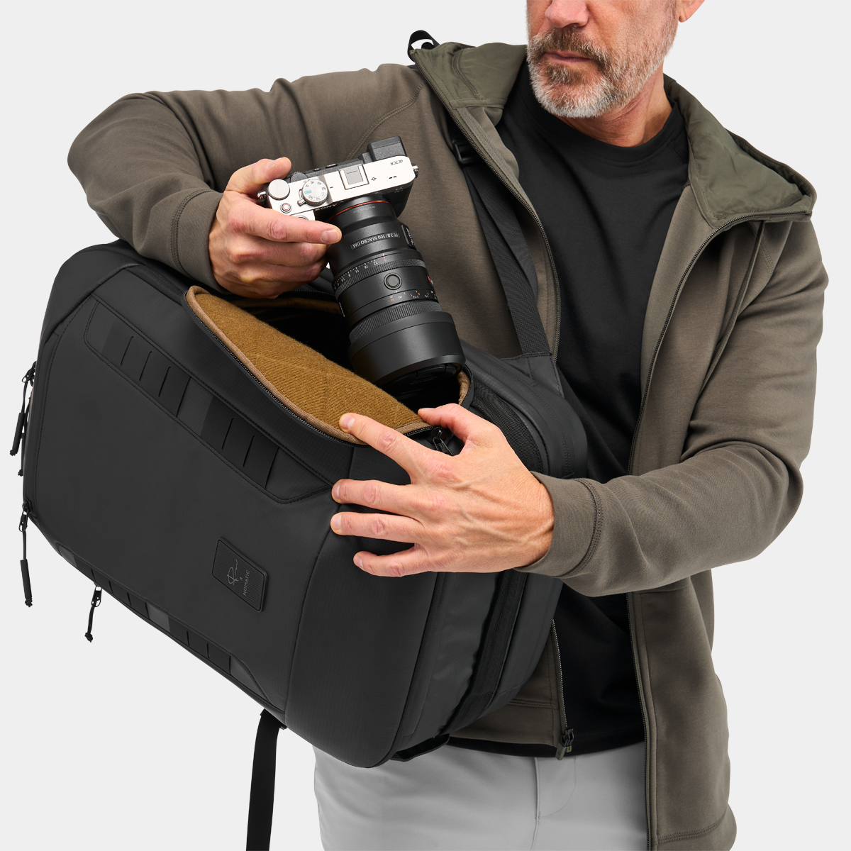 Black NOMATIC McKinnon Camera Pack 35L backpack, interior organization