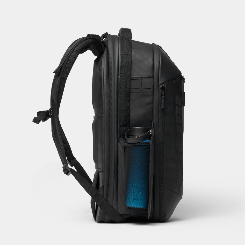 Black NOMATIC McKinnon Camera Pack 35L V2 backpack, front compartment open