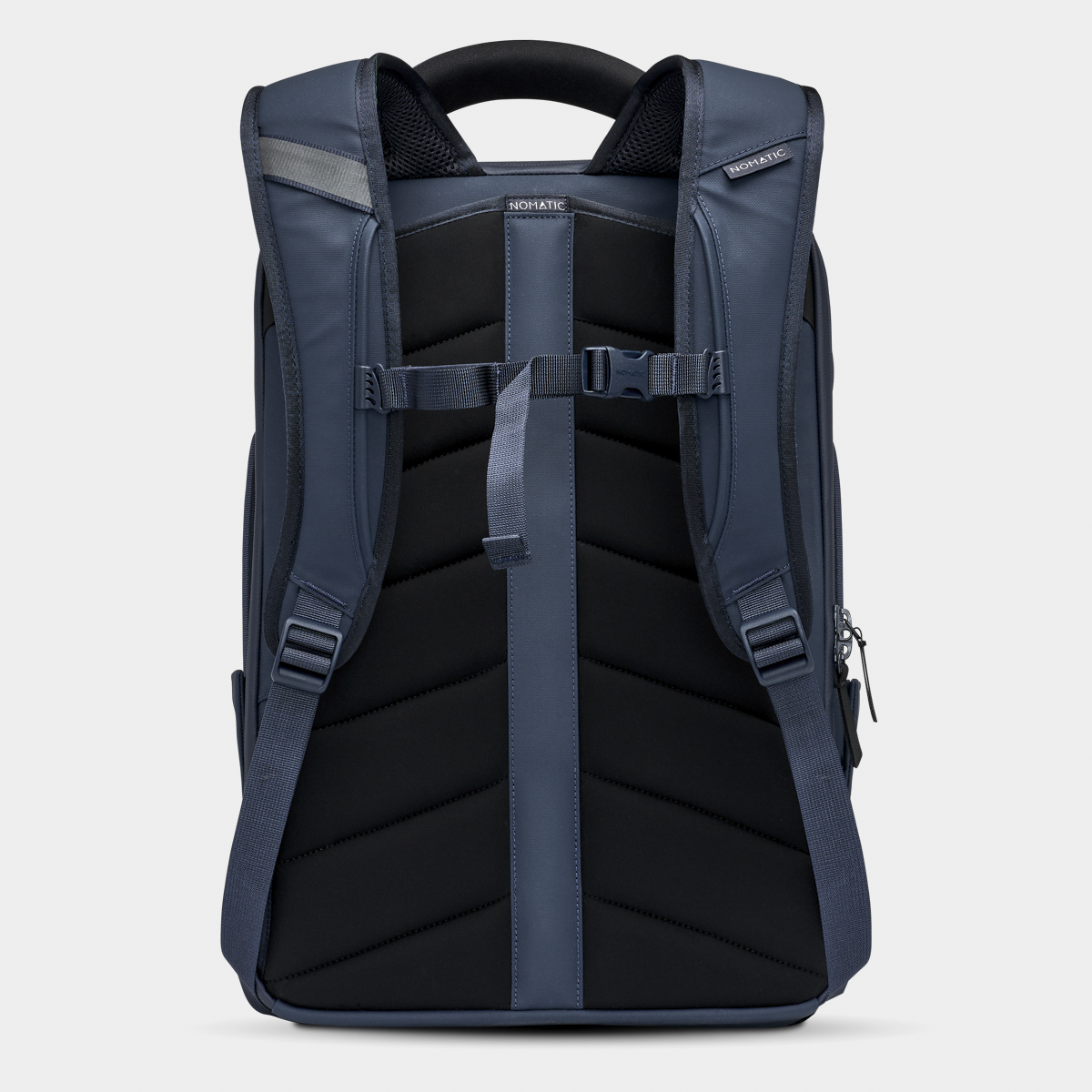 Nomatic Travel Pack 20L navy rear view showing padded straps and luggage sleeve#color_navy