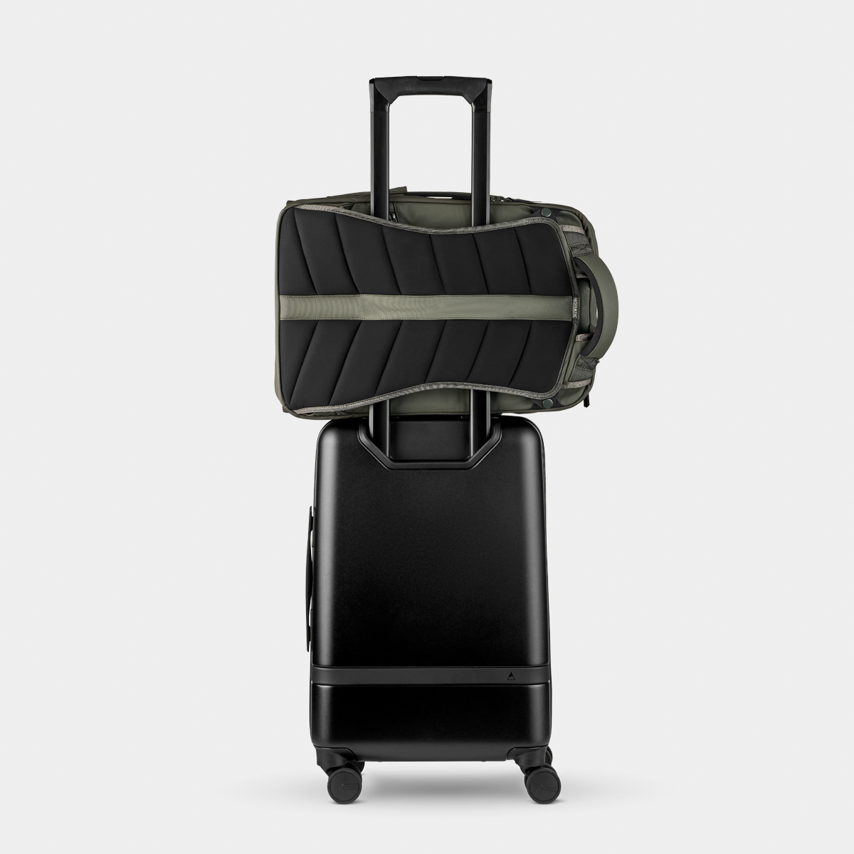 Nomatic Travel Pack 20L olive rear view showing luggage handle pass-through